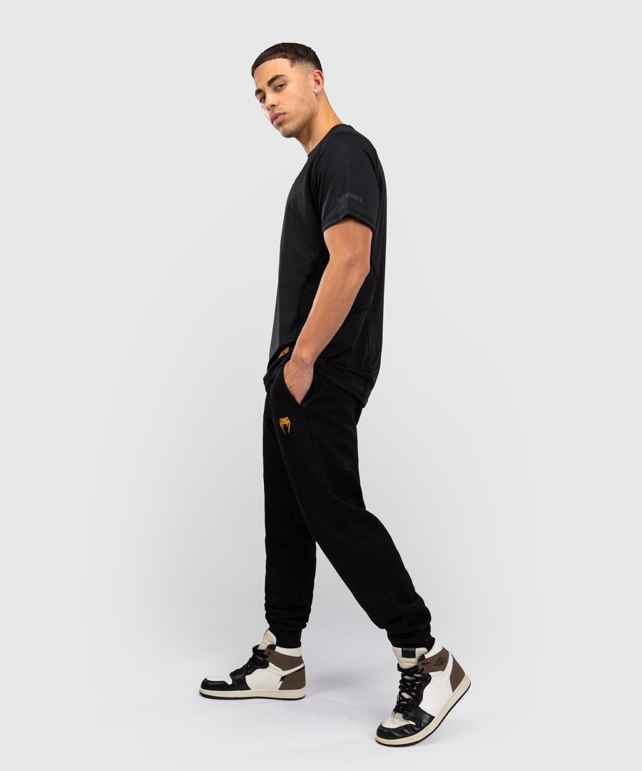 fk x venum hexagone mma joggingpak - zwartgoud