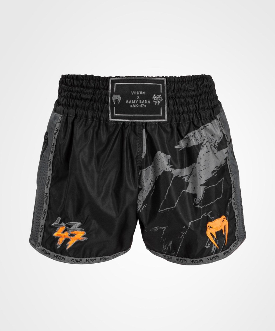 venum s47 muay thai short - zwartoranje